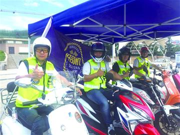 【社会广角（图片+摘要）】【走遍山东-青岛】青岛市成立全国首支好司机摩托车救援队
