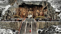 In pics: snow-covered Longmen Grottoes in Luoyang, C China's Henan