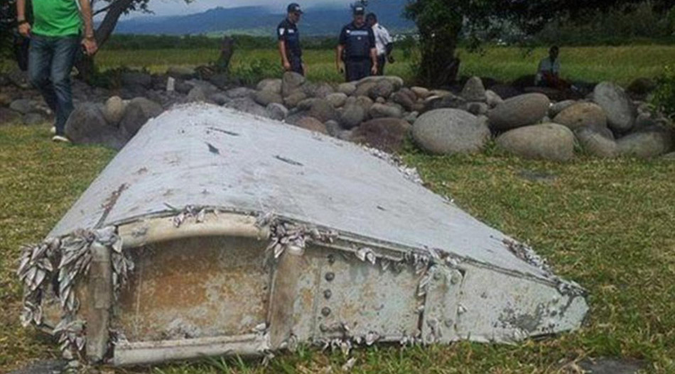 疑似MH370残骸地发现中国矿泉水瓶 疑似MH370残骸地发现中国矿泉水瓶
