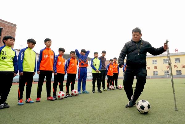 Rural teacher defies setbacks, chases soccer dream