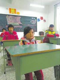 广东一女子7岁长瘤不长高 21岁仍孩童模样(图)