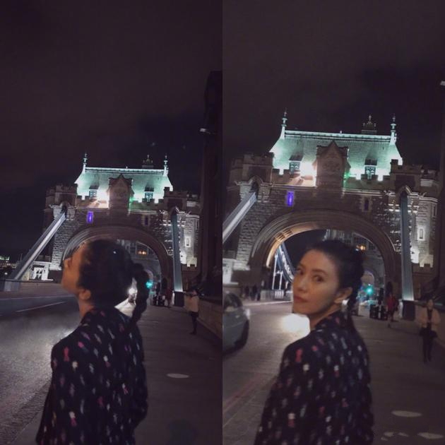 高圆圆绑利落麻花辫赏伦敦夜景 回眸的一瞬间亮了