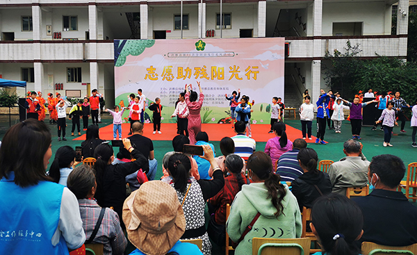 眉山洪雅县多形式开展助残日活动_fororder_志愿助残阳光行活动现场-摄影-李霞