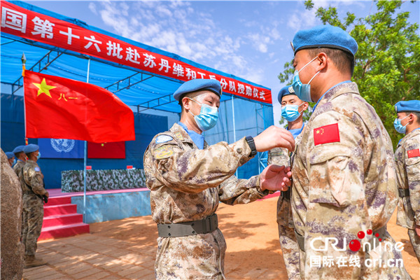 中国第16批赴苏丹维和工兵分队荣获联合国“和平荣誉勋章”_fororder___172.100.100.3_temp_9500033_1_9500033_1_1_0b9d947b-6939-4232-add2-79be31116fcb