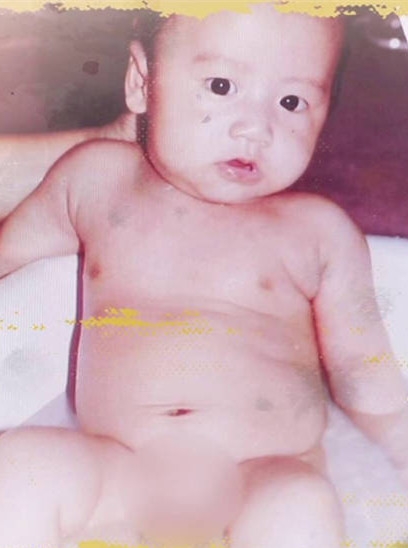 谢霆锋幼儿时期旧照曝光大眼溜圆白胖可爱