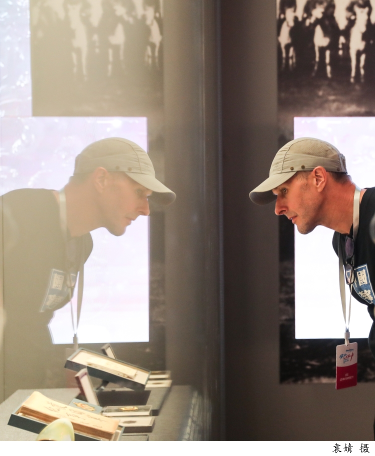 “打卡”闪光点，“洋网红”用镜头展示真实、立体、全面的中国