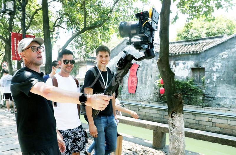 江苏：外国网红打卡苏州_fororder_7ab1736c2e7d4cbaa7e065dde10733b3Vij5_m