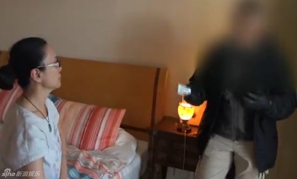 组图：傅艺伟被抓现场曝光 面色憔悴欲落泪