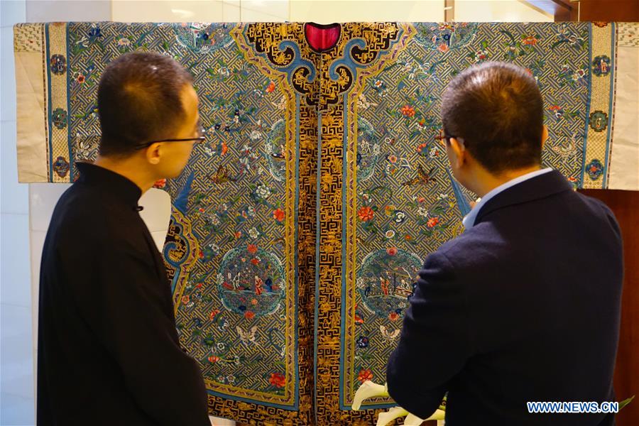 Exhibition of vintage Chinese garments by private collector and designer held in Beijing