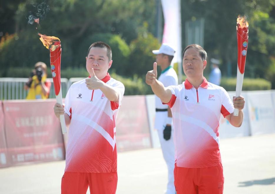La deuxième étape du relais de la flamme des 14e Jeux nationaux, des 11e Jeux nationaux pour les personnes handicapées et des 8e Jeux olympiques spéciaux nationaux de la Chine lancée à Weinan_fororder_2