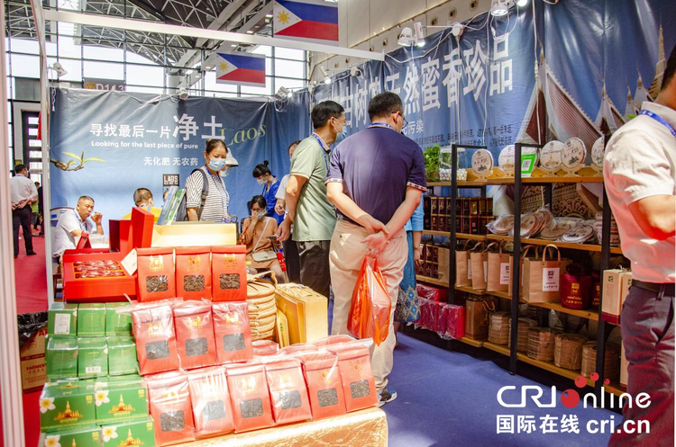 【东博会进行时】东博会老挝展区：红酸枝家具吸睛 咖啡茶叶受热捧_fororder_图片26