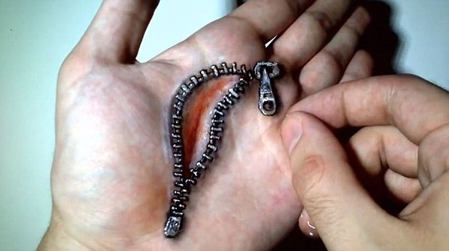 胆小慎入法国艺术家在手上绘出魔幻3d图视频