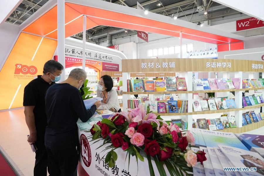 Le Salon international du livre de Beijing met en lumière les 100 ans d'histoire du PCC_fororder_2_副本