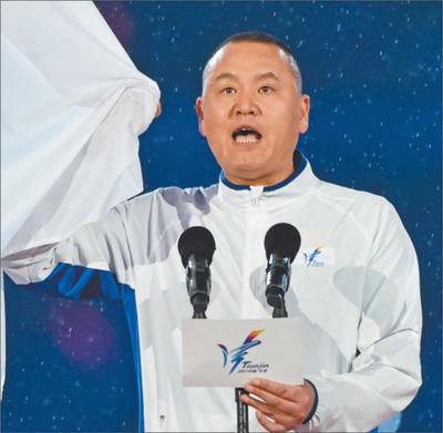 金牌教练徐国义一池水一辈子 让中国游泳挺起腰杆