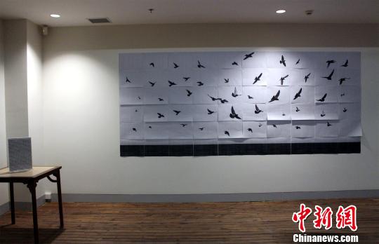 信鸽文化艺术联展北京开展 比利时及台湾地区作品参展