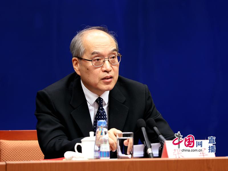 司法部部长全国普法办主任张军回答记者提问