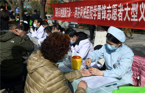 西安经开区举办2022年学雷锋志愿服务活动启动仪式  弘扬志愿服务精神 西安经开区在行动_fororder_图片1