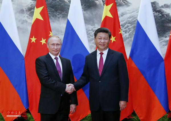 境外媒体：普京访问促中俄关系再升温