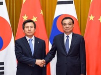 李克强同韩国国务总理黄教安举行会谈