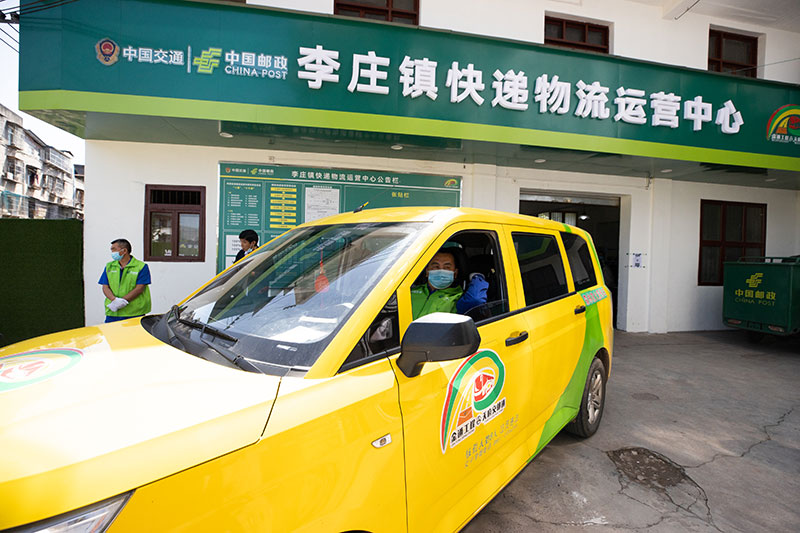 宜宾翠屏：小黄车带动物流跑起来 “交邮融合”打通镇村物流“肠梗阻”_fororder_李庄镇快递物流运营中心-摄影-叶昌荣
