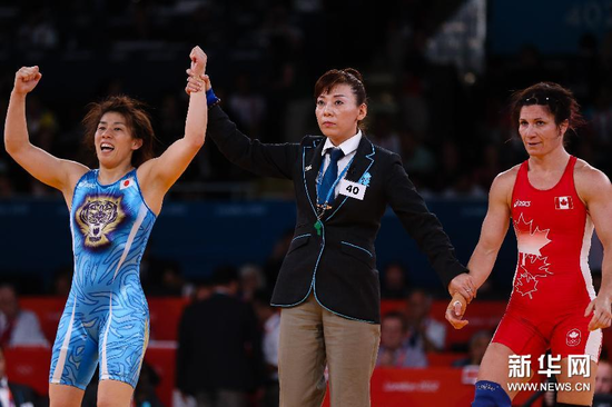 日摔跤名将成日本首位女奥运队长 里约冲4连冠 日摔跤名将成日本首位女奥运队长 里约冲4连冠