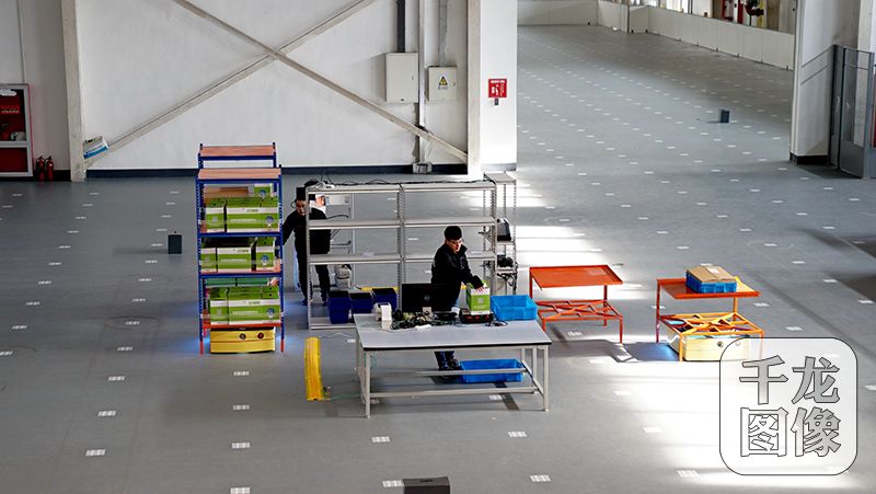 北京亦莊建成全國首個跨境電商智慧機器人倉庫