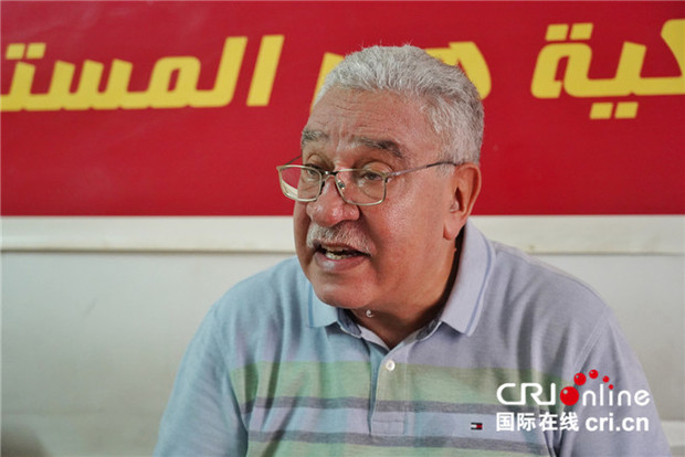 图片默认标题_fororder_埃及共产党总书记萨拉赫·阿德利接受记者采访.j
