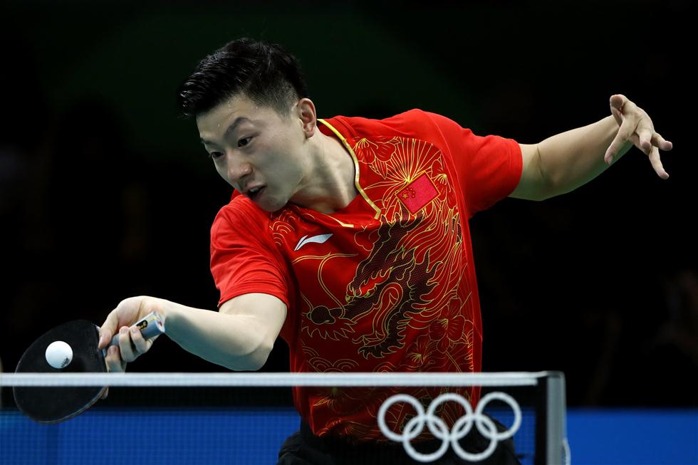 乒乓球:马龙晋级男单八强