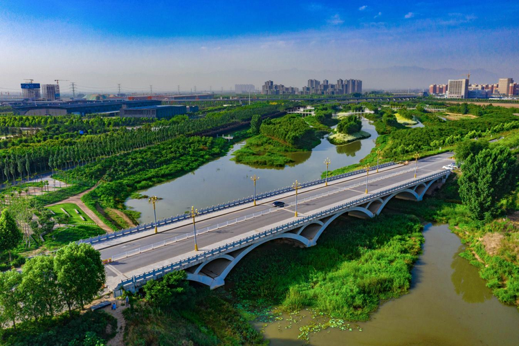 沣西新城：推动绿色发展 建设人与自然和谐 共生的现代化新城_fororder_图片2