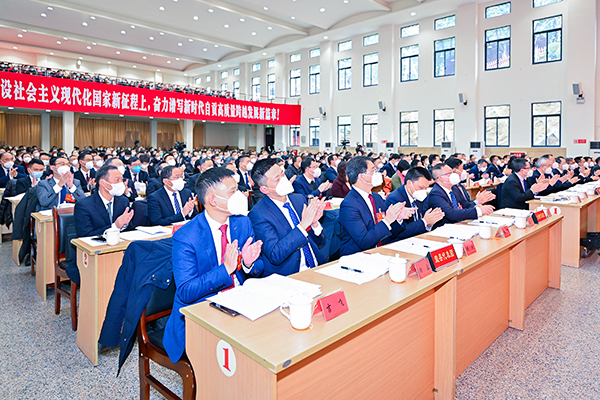 第二次会议开幕_fororder_4与会代表听取报告后热烈鼓掌(摄影-廖志全)