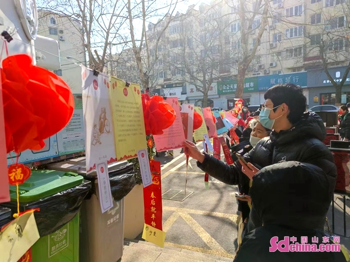 猜谜剪纸闹元宵 青岛市市南区图书馆与市民读者“书式”过佳节