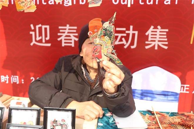 【新春走基层】西安新春年味浓 街头体验非遗之美_fororder_图片8