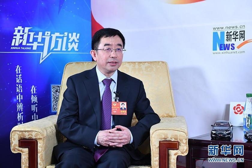 两高报告20多次鼓掌背后有何深意?连玉明委员为你解析