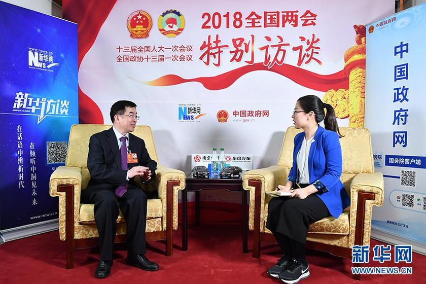两高报告20多次鼓掌背后有何深意?连玉明委员为你解析