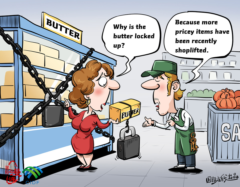 【Editorial Cartoon】New measures in British supermarkets_fororder_s英【国际漫评】英国超市的新操作