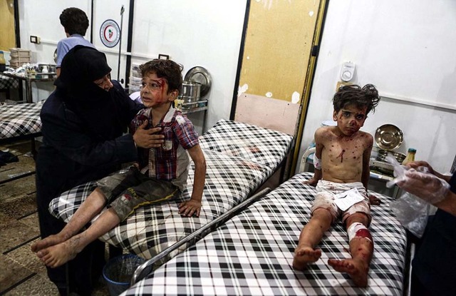 (网页截图) 5岁叙利亚男孩达尼希在空袭中受伤的照片发布6天后,反对派