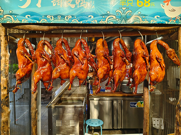 （张）乐山：畅游嘉州 集食行乐_fororder_甜皮鸭+摄影+张琬沁