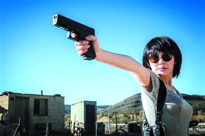 许晴首次当打女 这个POSE很有型！(图)