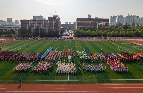 信阳市平桥区举办第二十届中小学生运动会_fororder_2