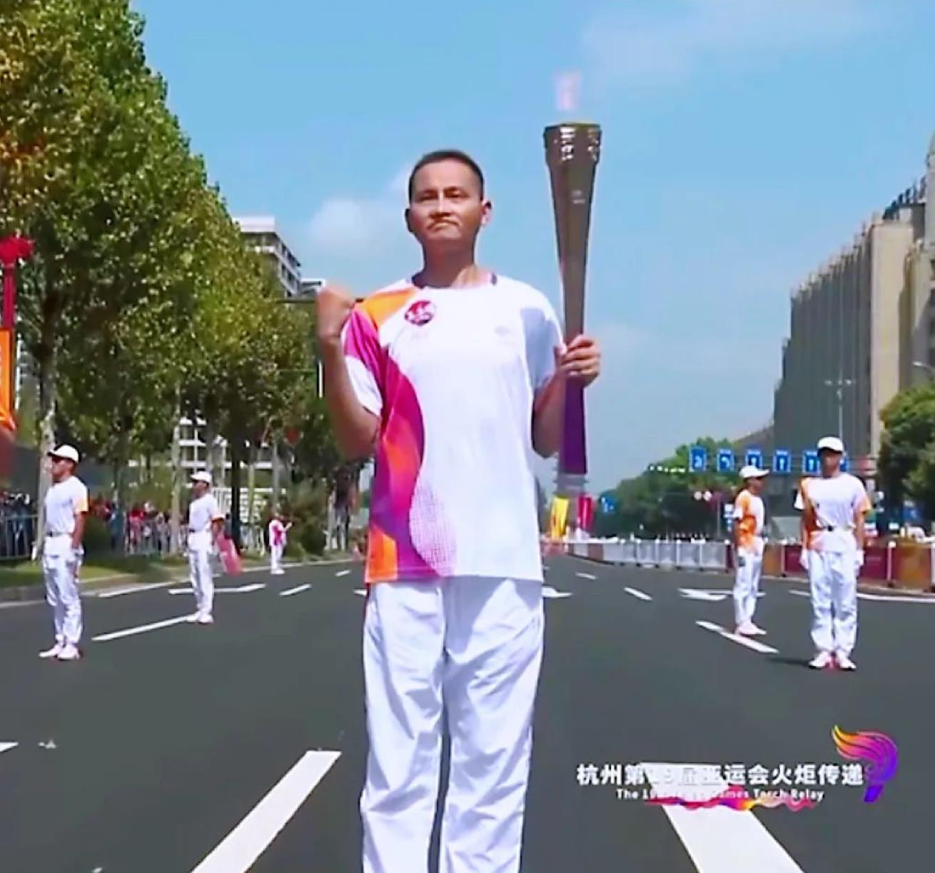 亚运火炬手金光辉:“薪火”相传,是荣誉,更是责任与担当! - 国际在线移动版