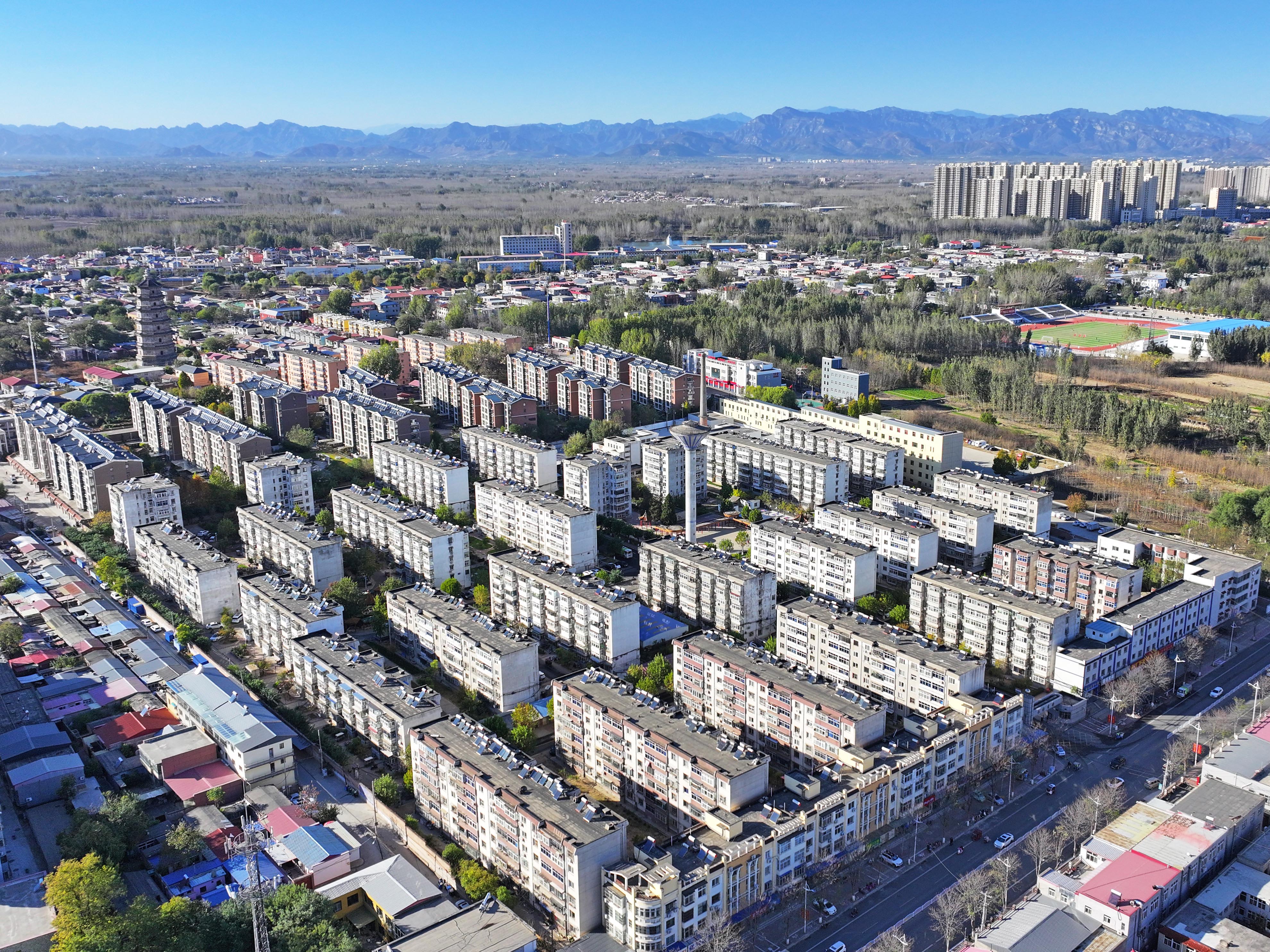 河北涿州：凝心聚力重建美好家園_fororder_恢復重建後的涿州市雙塔街道天橋街社區永濟秀園小區。熊華明攝