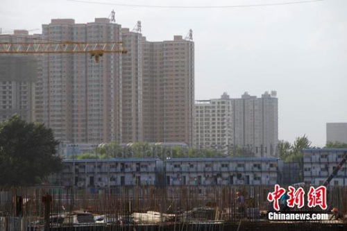 中国多地接连出台楼市调控新政 能否稳住房价？