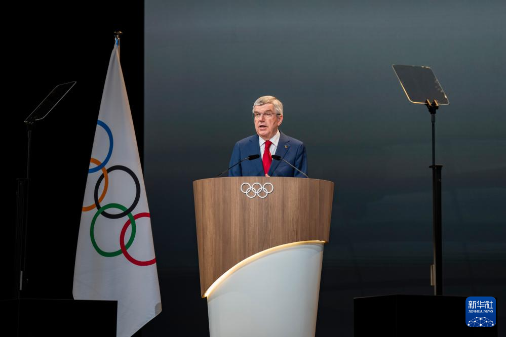 69697月23日,国际奥委会主席巴赫在会上致辞.新华社记者 孙非 摄