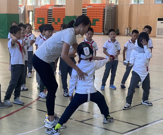 “傳承冠軍精神 爭做強國少年”主題活動亮相南京青奧村外國語小學_fororder_圖片 3