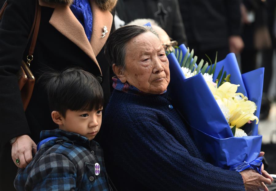 南京举行南京大屠杀死难者遗属家庭祭告活动