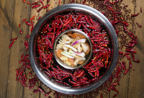 张平和渝味晓宇火锅的23年 看重庆人的精神缩影