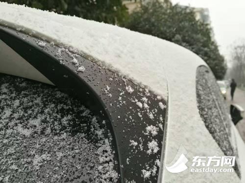 【旅游大文字】申城迎来新年“初雪” 将延续至9日中午