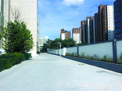 奥运村“门前六包”包出一条路