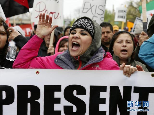 美国各地民众举行劳动节游行