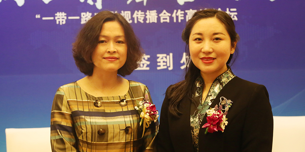 国际在线副总裁何清与中经全媒体总编辑李远合影